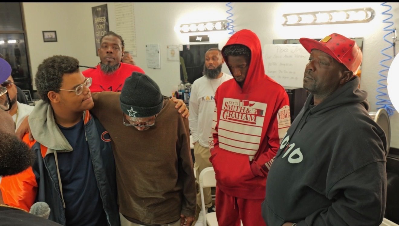 Men in conversation at MenUp365 community gathering